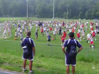 Staff overlooking field